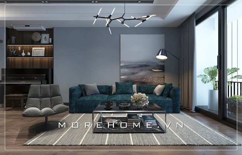 Bộ sofa với tone màu sậm đóng vai trò là điểm nhấn giúp phòng khách trở nên tiện nghi và ấn tượng hơn trong mắt người nhìn.